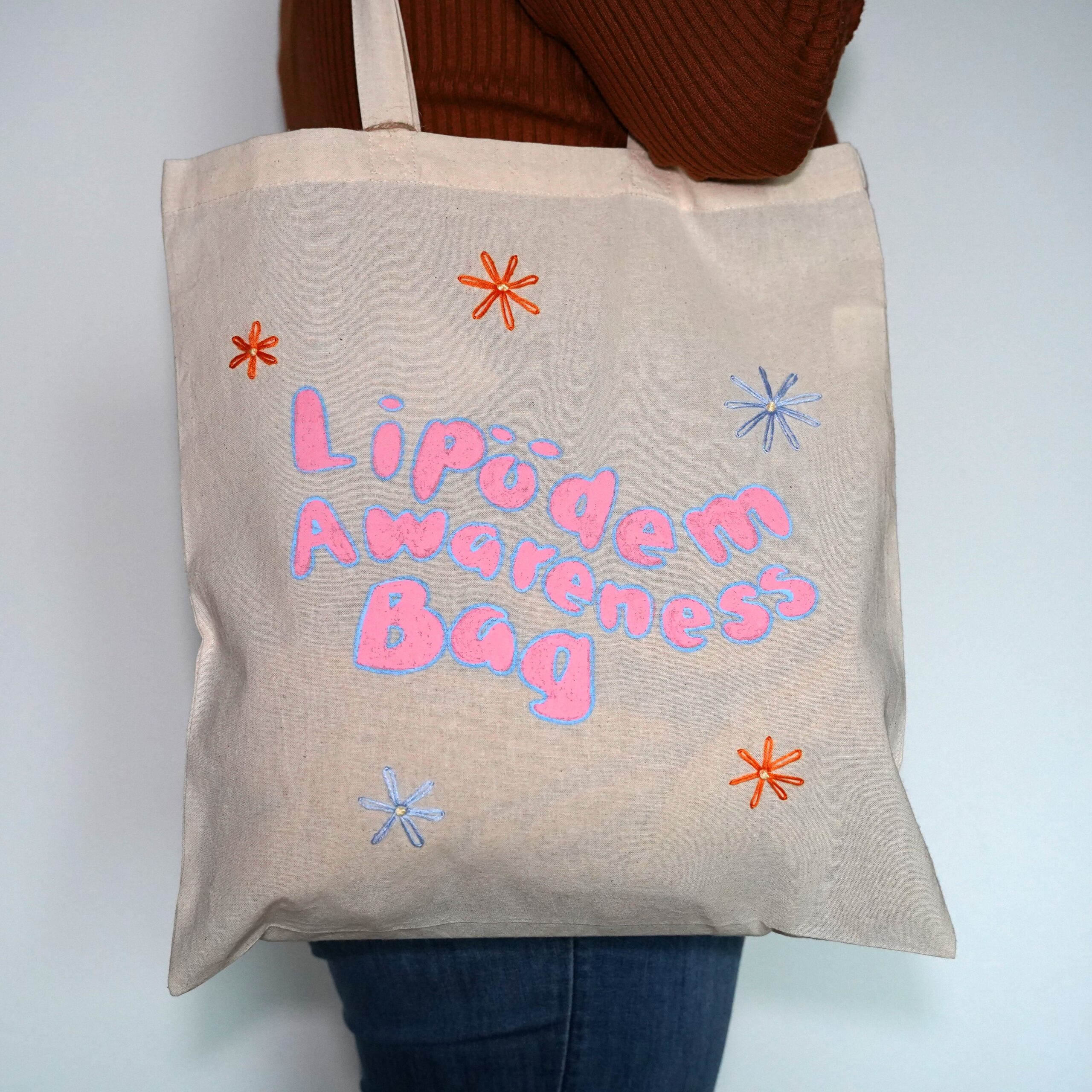 Henkeltasche "Lipödem Awareness Bag" Blumen - handbemalt / bestickt